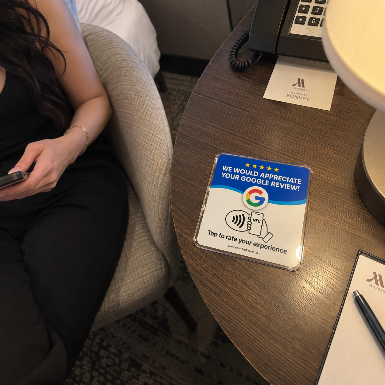 Google review plaque placed on a hotel guest table